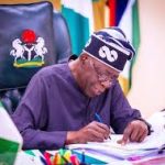 Nigerian President Tinubu signs 2025 tax reform bill at Abuja ceremony